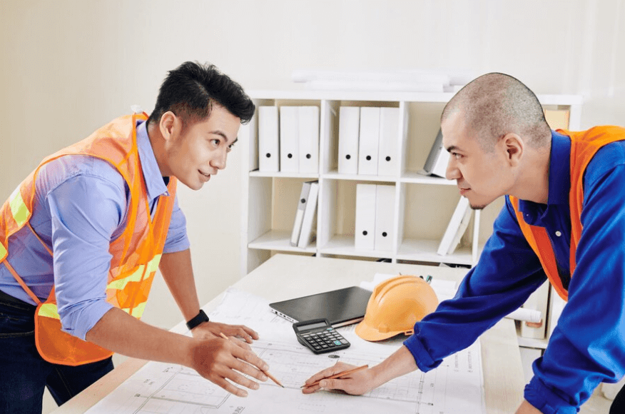 Team discussing the Demolition Estimating Services on table